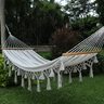 Canvas Hammock Upcycled - Transforming discarded materials into island luxury.